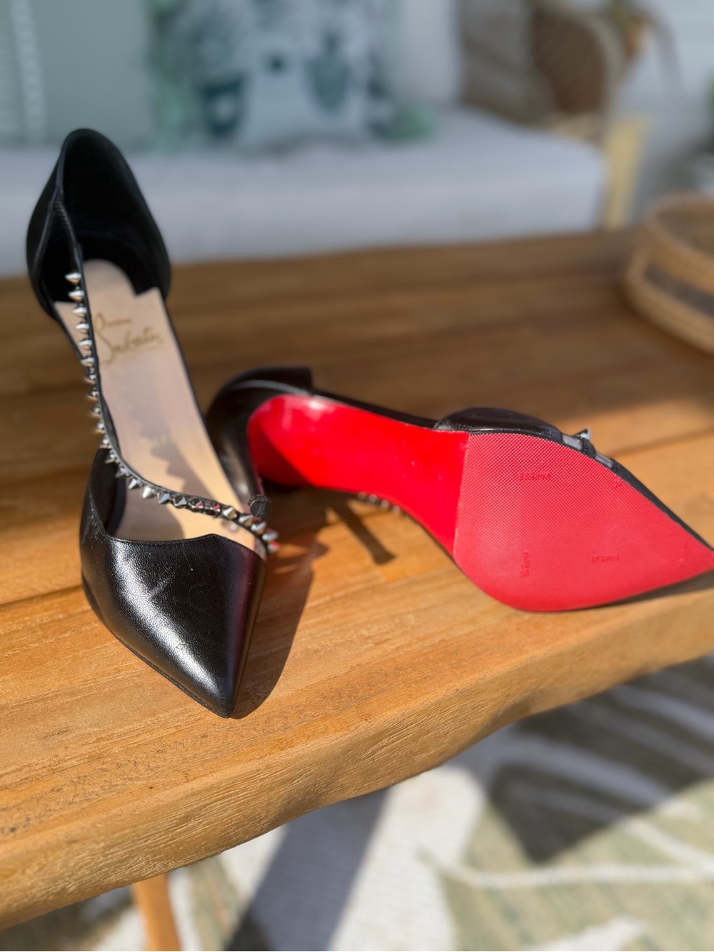 Christian Louboutin Black Leather Pointed Studded Pumps with Red Sole